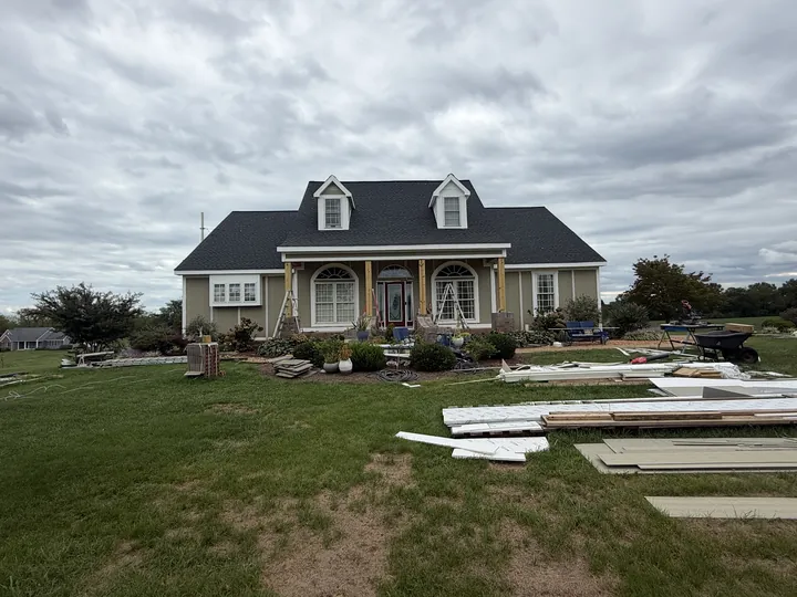 Front view of the Spotsylvania home with new James Hardie siding and white window trim